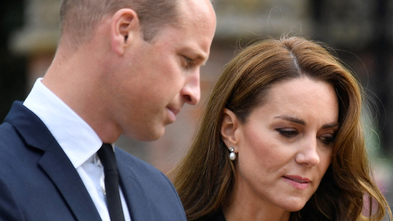 William, Prince of Wales and Catherine, Princess of Wales grieving