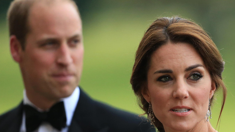 Prince William and Kate Middleton at an event.  