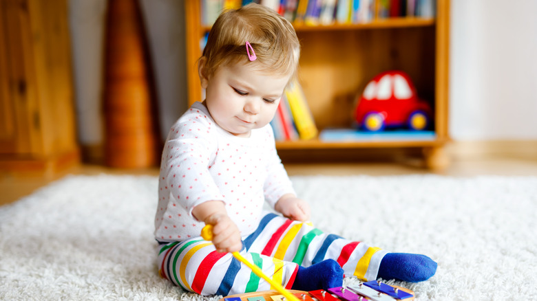 Baby girl playing