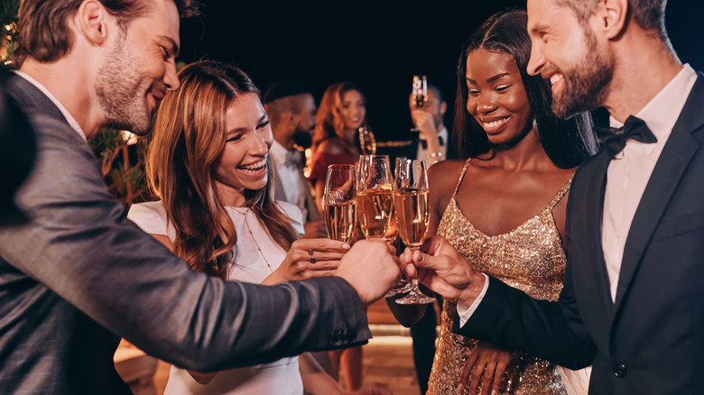 Wedding guests toasting