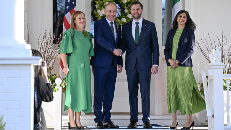 Micheál and Mary Martin smiling with JD and Usha Vance