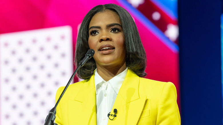 Candace Owens speaking into mic