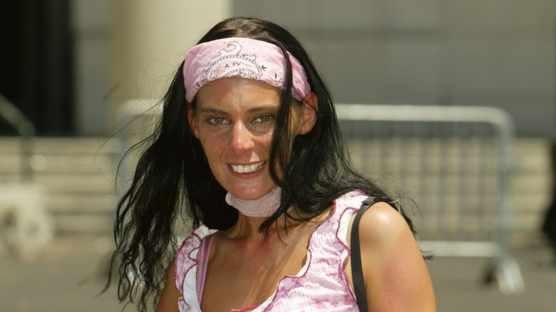 Paula Goodspeed wearing a pink headband