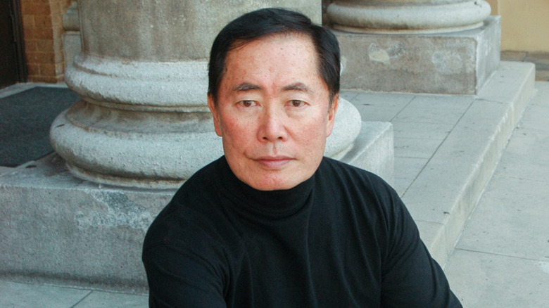 George Takei posing on a stoop in 2005