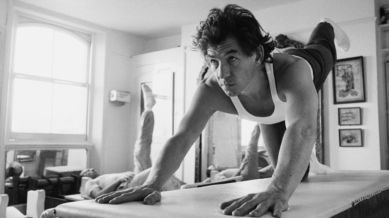 Ian McKellen doing yoga poses in 1984
