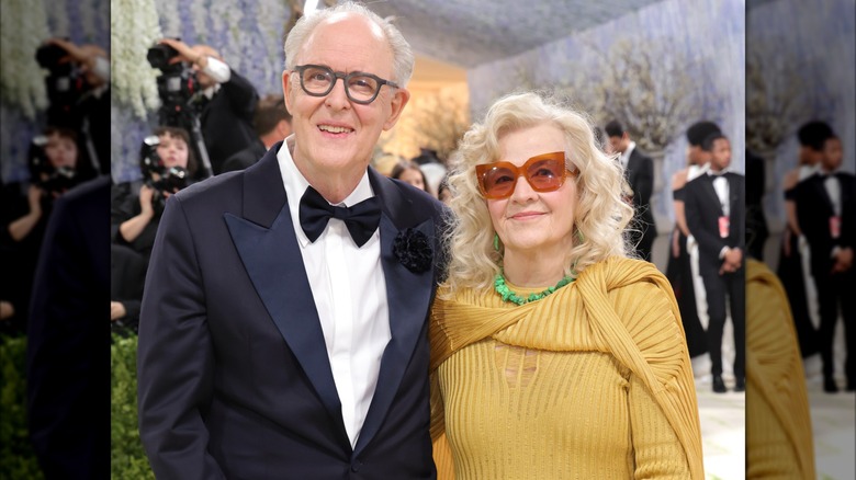 John Lithgow and Mary Yeager smiling while posing together at the 2026 Met Gala