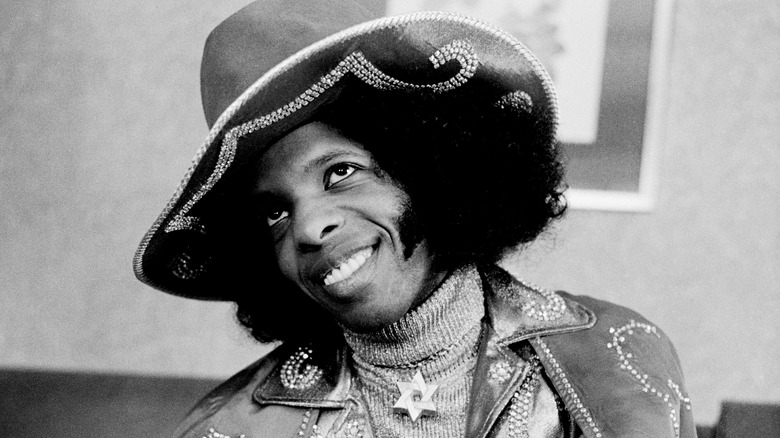 Sly Stone smiling