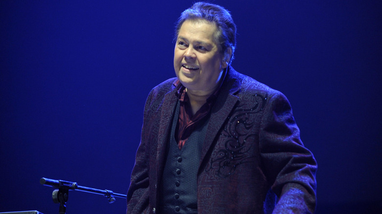 Alan Osmond smiling