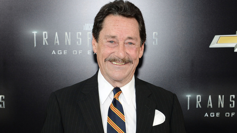 Peter Cullen grinning at the camera