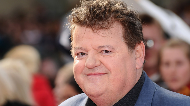 Robbie Coltrane smiling camera