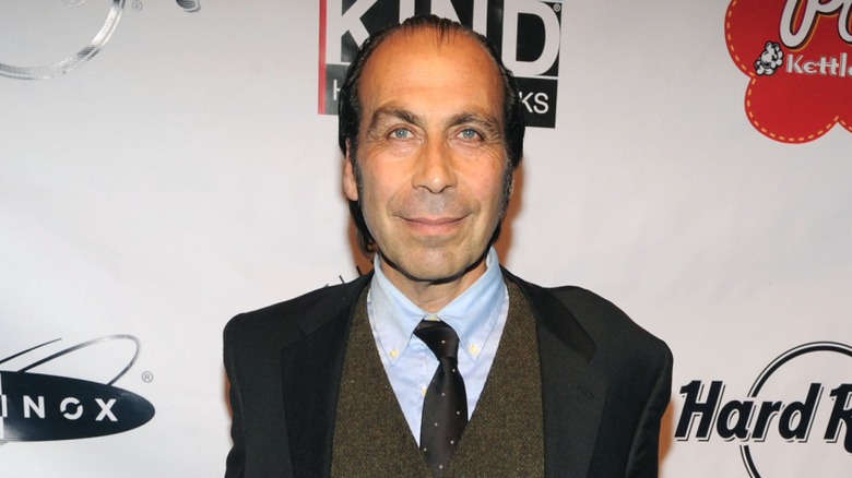 Taylor Negron smiling on the red carpet in Los Angeles