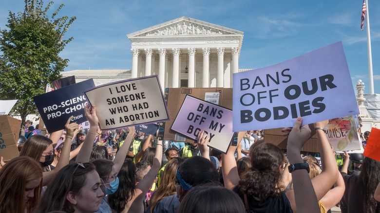 Signs outside of an abortion protest 