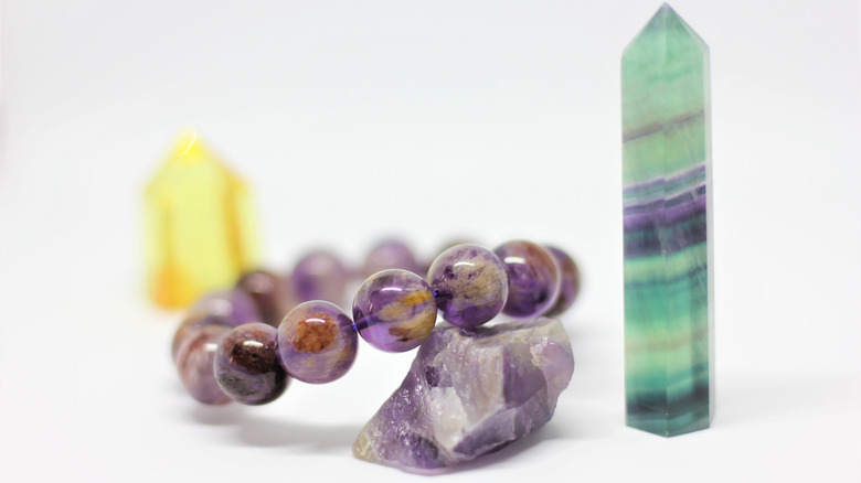 Crystal bracelet, stone, and towers.