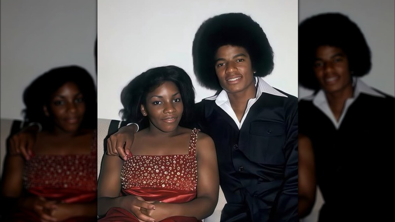 Stephanie Mills and Michael Jackson smile for a photo circa the '70s