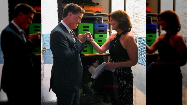 Stephen Colbert and his wife, Evie McGee, share a fist bump