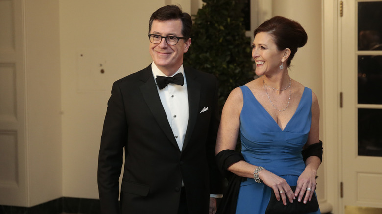 Stephen Colbert and Evelyn McGee attend a White House dinner in 2014