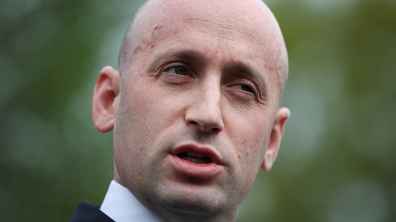 Close up of Stephen Miller looking concerned