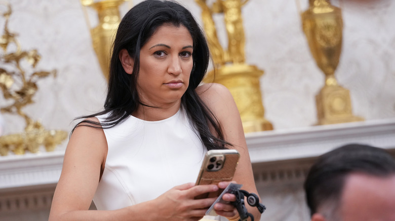 Katie Miller looking bored