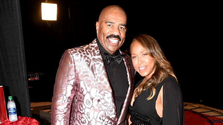 Steve and Marjorie Harvey attending an event