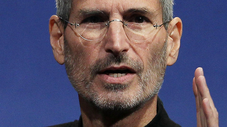 Steve Jobs in trademark outfit