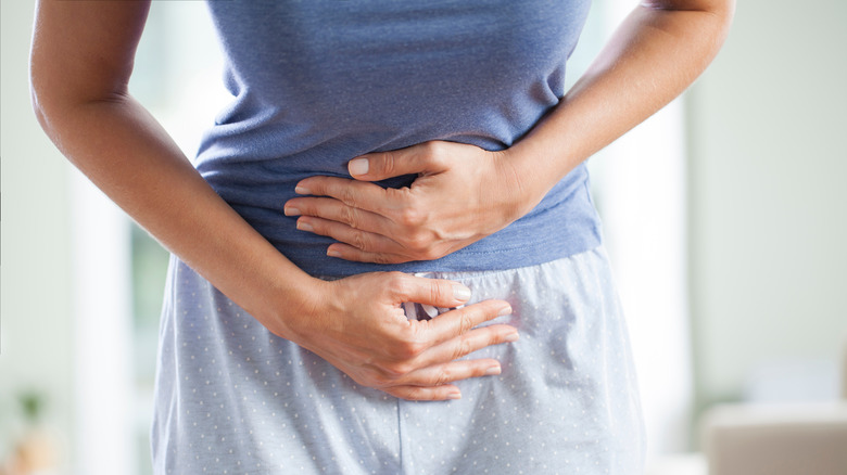 Woman with abdominal discomfort