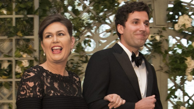 Sarah Huckabee Sanders and Bryan Sanders arrive at the White House for a state dinner in Washington, DC (2018)