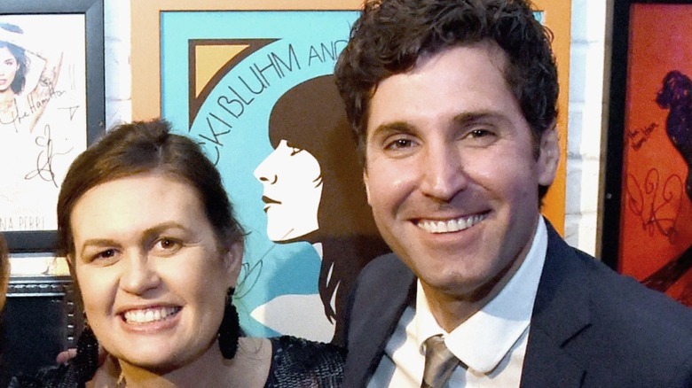 Sarah Huckabee Sanders and Bryan Sanders attend Mother Nature Network Presents White House Correspondents' Jam IV in Washington, DC (2018)