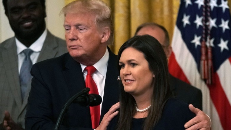Donald Trump and Sarah Huckabee Sanders in the East Room of the White House in Washington, DC (2019)