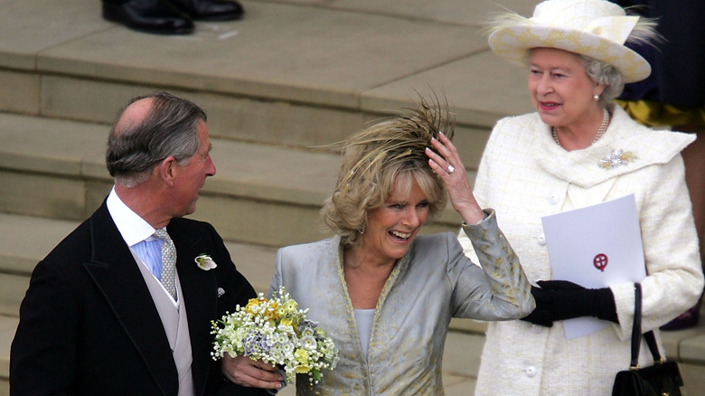 Queen Elizabeth and Camilla smiling at wedding 
