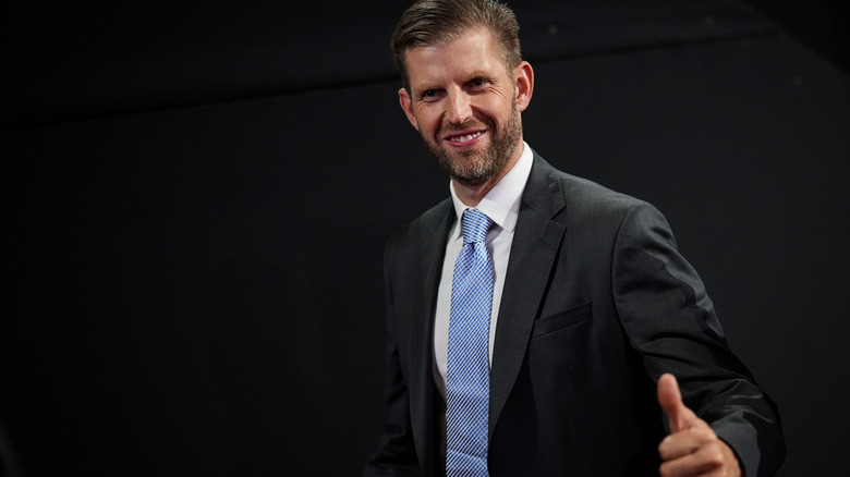 Eric Trump grinning while giving the camera a thumbs-up