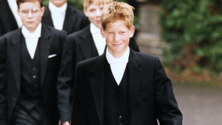 Prince Harry walking with other schoolboys