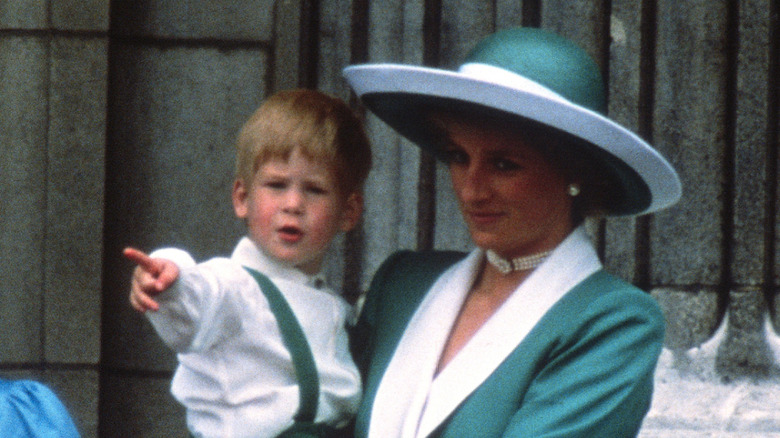 Princess Diana holding Prince Harry
