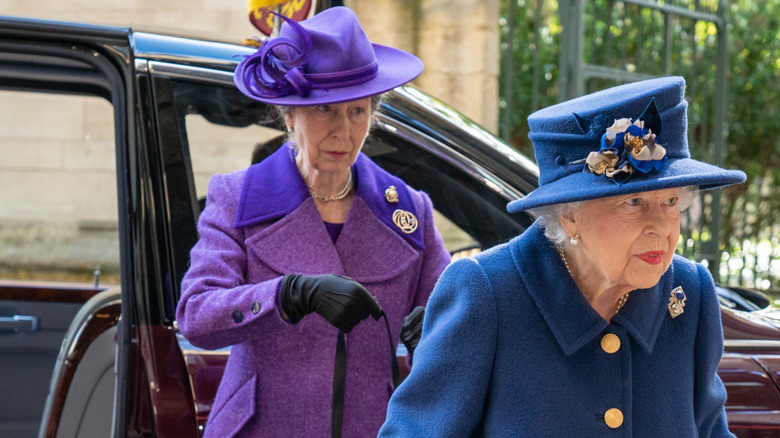Princess Anne behind Queen Elizabeth