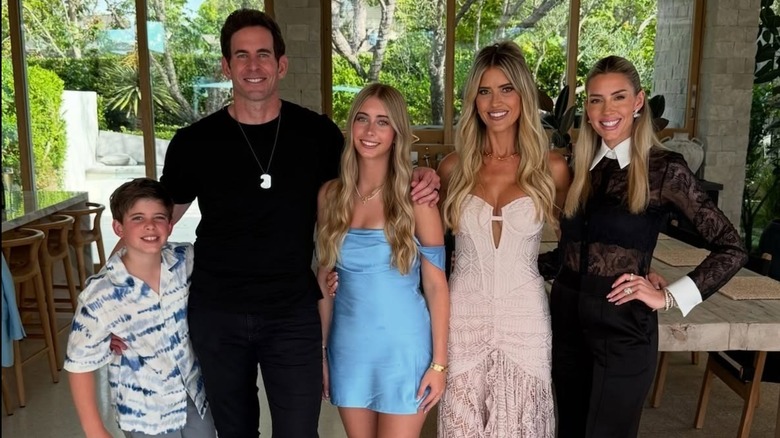 Brayden, Tarek, and Taylor El Moussa, Christina Haack, and Heather Rae El Moussa all smiling togetherRae El Moussa Christina