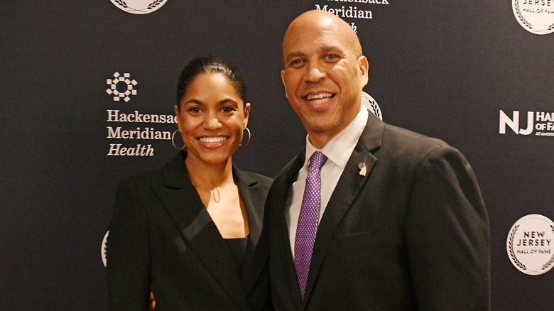 Cory Booker and Alexis Lewis attend an event