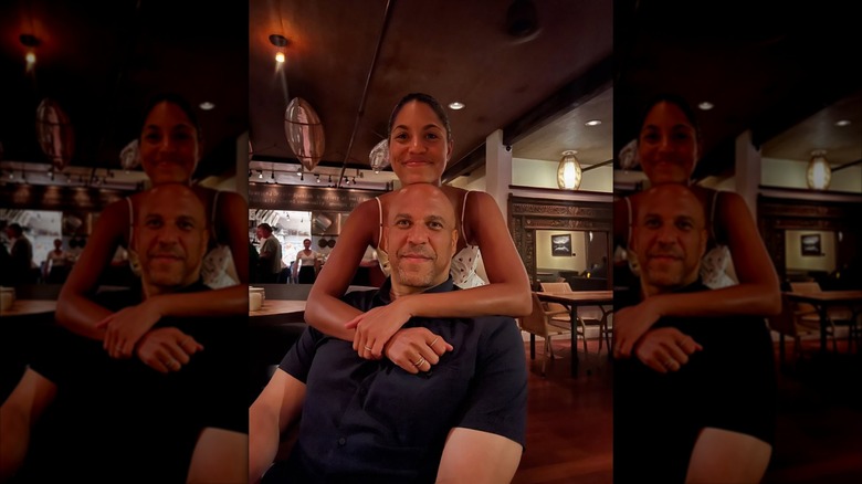 Alexis Lewis puts her arms around Cory Booker