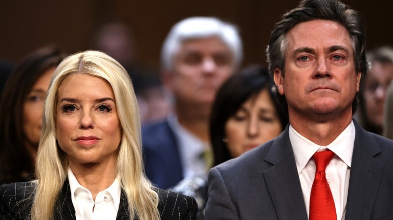 Pam Bondi and John Wakefield sit together her confirmation hearing on Capitol Hill in Washington, DC (2025)