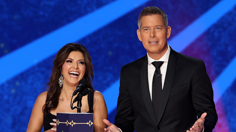 Sean Duffy and wife Rachel Campos-Duffy speak at a podium.