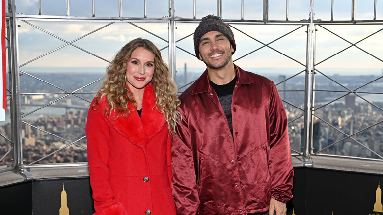 Alexa and Carlos PenaVega smiling together