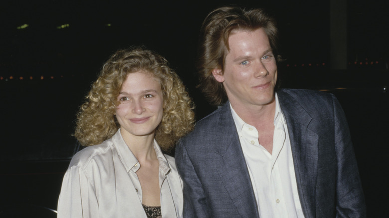 Kyra Sedgwick and Kevin Bacon smiling while attending an event together