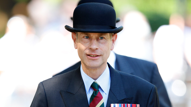 Closeup of Prince Edward walking outside
