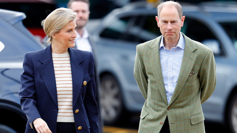 The Duke and Duchess of Edinburgh walking outside