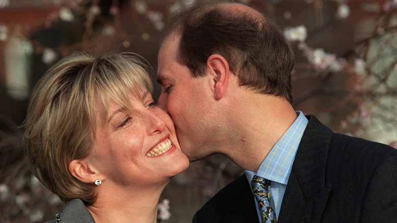 Prince Edward kissing his wife on the cheek