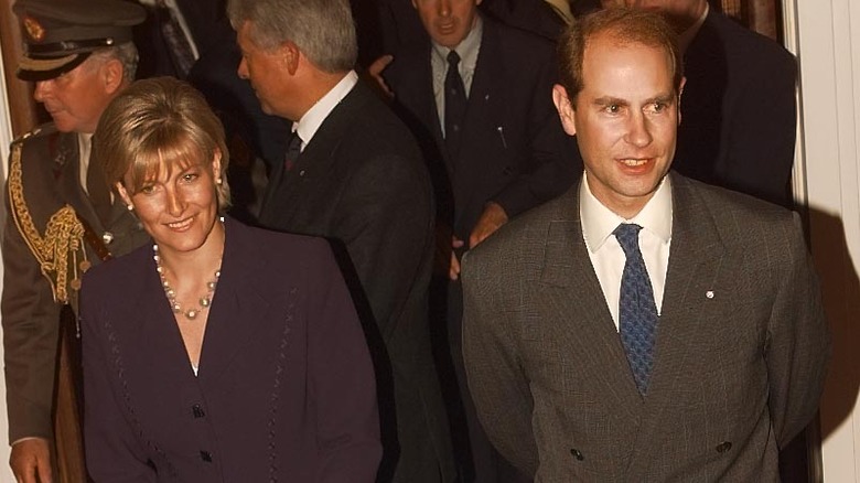 Prince Edward and Sophie Rhys Jones in a crowded room in 1999