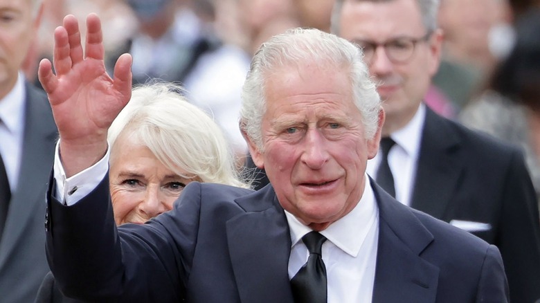 King Charles III waving 