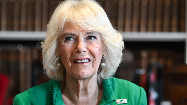 Queen Camilla in green suit 