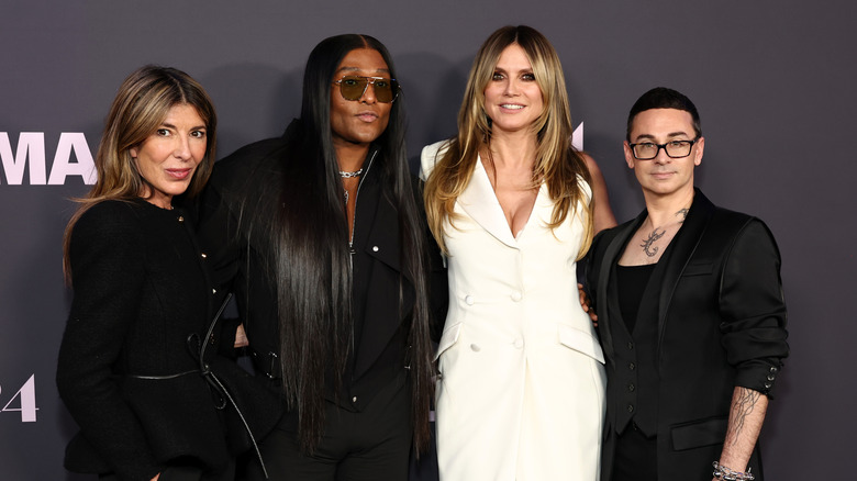 Nina Garcia, Law Roach, Heidi Klum, and Christian Siriano arm-in-arm on the red carpet in 2026
