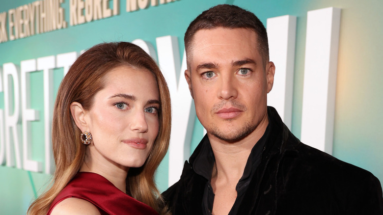 Alexander Dreymon and Allison Williams posing at an event