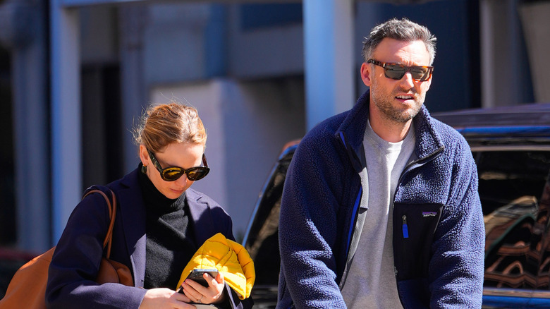 Cooke Maroney and Jennifer Lawrence in the street