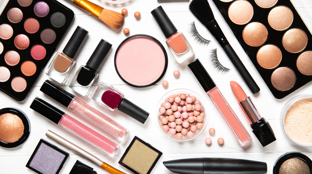 An array of makeup on an all white background